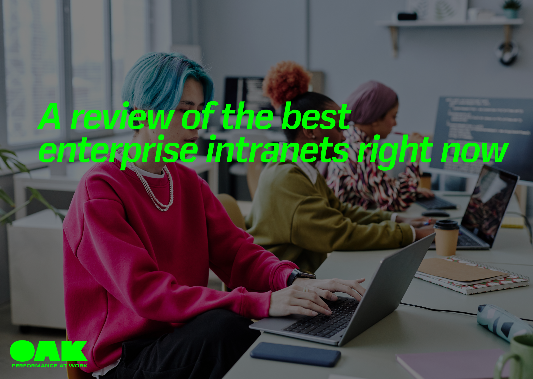 office workers at laptops with overlay of best enterprise intranets right now