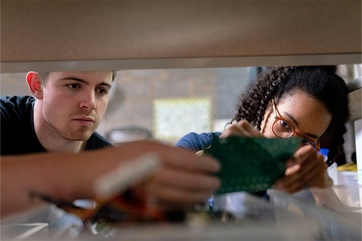 two engineers looking at software